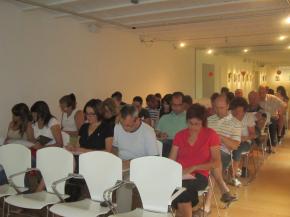 Los asistentes al taller realizando una tarea. Pincha para ampliar